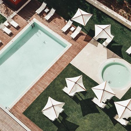 The Editory By The Sea Troia Comporta Hotel Екстер'єр фото Aerial view of the pool at the Hotel